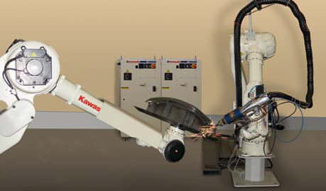 Proces cięcia laserem realizowany przez dwa roboty Kawasaki